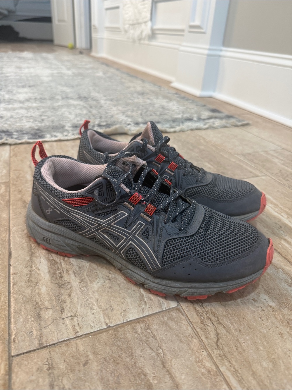ASICS women’s  Athletic Shoes in Charcoal Gray with Coral Accents